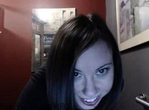 Web cam dark-haired chick having a..